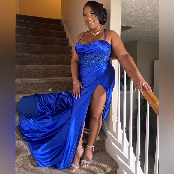 This is a size 12 Royal blue Villoni brand prom dress, with a slit on the right. - Picture 3 of 4